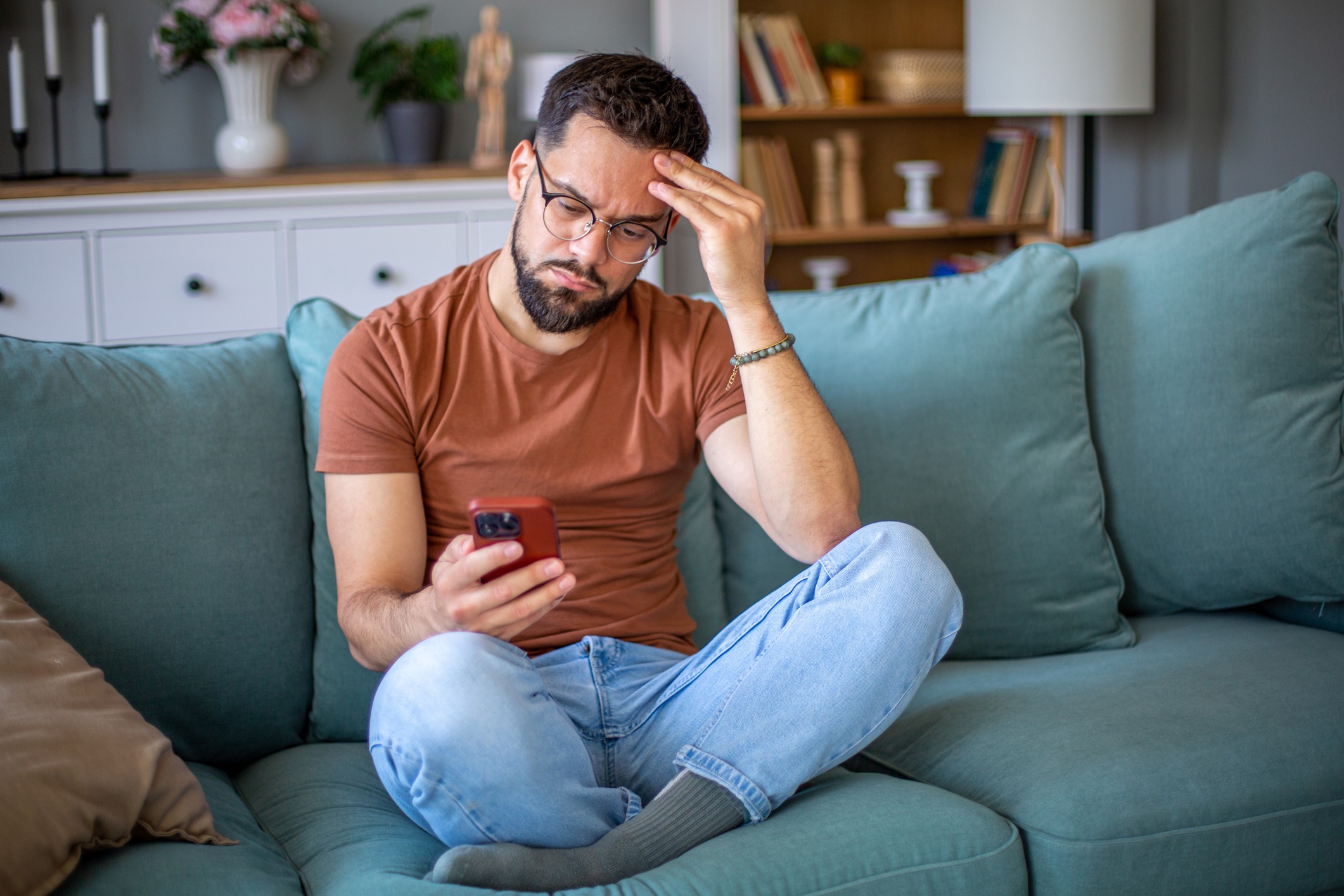 Person at standing desk working on laptop